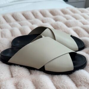 St. Agni Cream and Black Slide Sandals